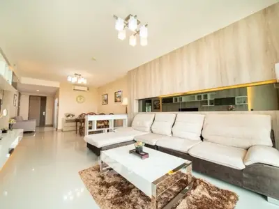 Spacious modern living room with plush sofa and elegant decor