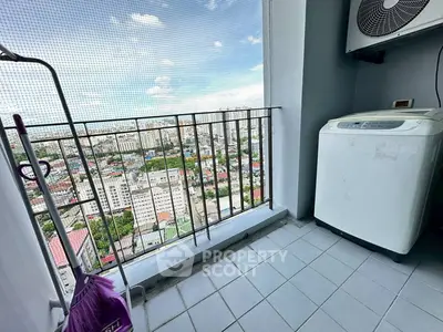 High-rise balcony with city view and washing machine, perfect for urban living.