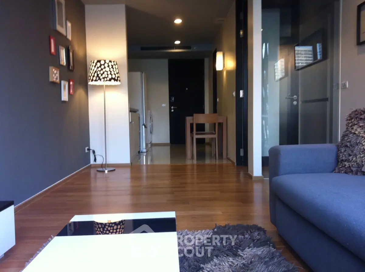 Modern living room with stylish decor and open layout in a contemporary apartment.