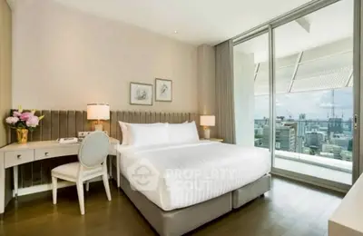 Luxurious bedroom with city view and elegant decor, featuring a large bed and stylish furniture.