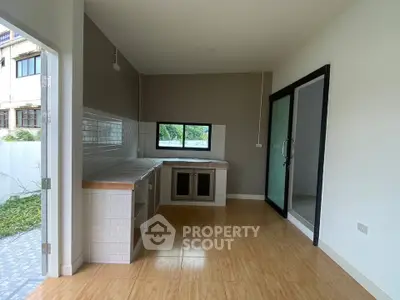 Modern kitchen with sleek design and ample natural light