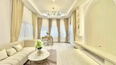 Luxurious living room with elegant decor and ample natural light