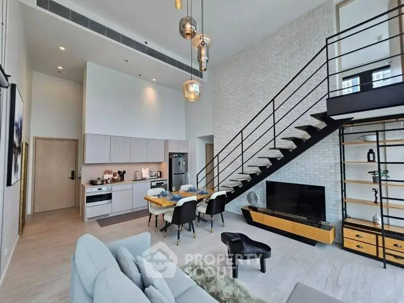 Modern loft apartment with open kitchen and stylish living area