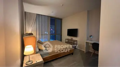 Modern bedroom with city view, featuring cozy bed, stylish furniture, and ambient lighting for a serene atmosphere.