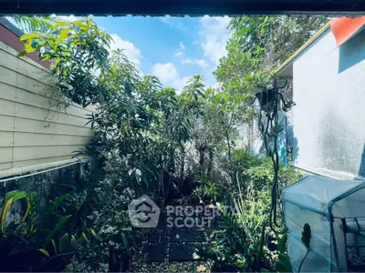 Charming garden oasis with lush greenery and serene atmosphere, perfect for relaxation and outdoor enjoyment.