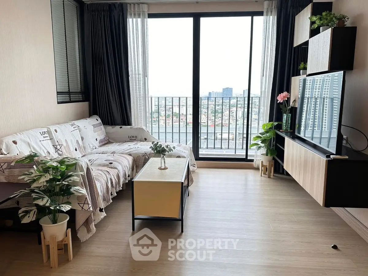 Modern living room with balcony view and stylish decor