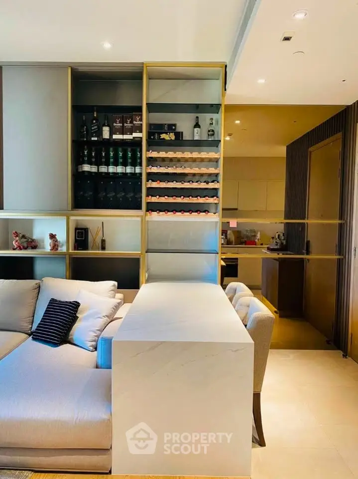 Luxurious living room with built-in wine rack and modern furniture