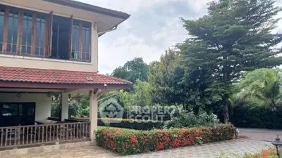 Charming suburban home with lush garden and spacious driveway, perfect for family living.