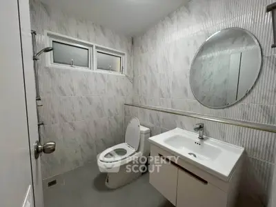 Modern bathroom with sleek fixtures and elegant tile design