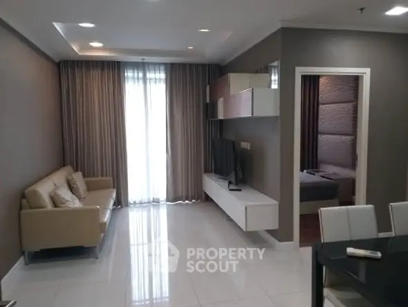 Modern living room with sleek furniture and elegant decor in a contemporary apartment.