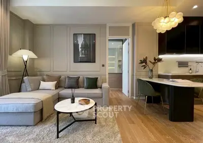 Luxurious modern living room with elegant decor and open kitchen layout