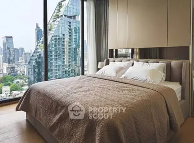 Luxurious bedroom with stunning city view and modern design in high-rise apartment.