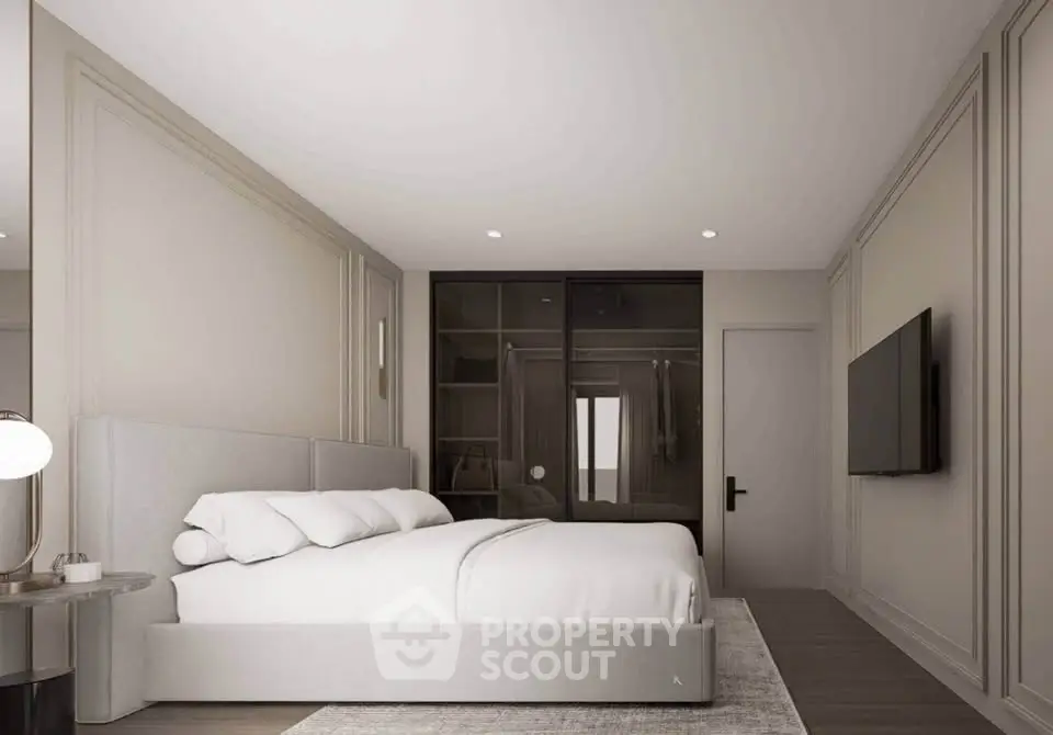 Luxurious modern bedroom with sleek design and spacious walk-in closet.