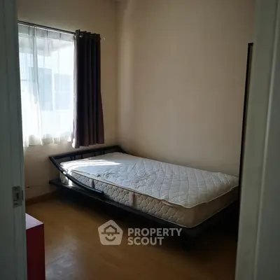 Cozy bedroom with natural light and minimalist design