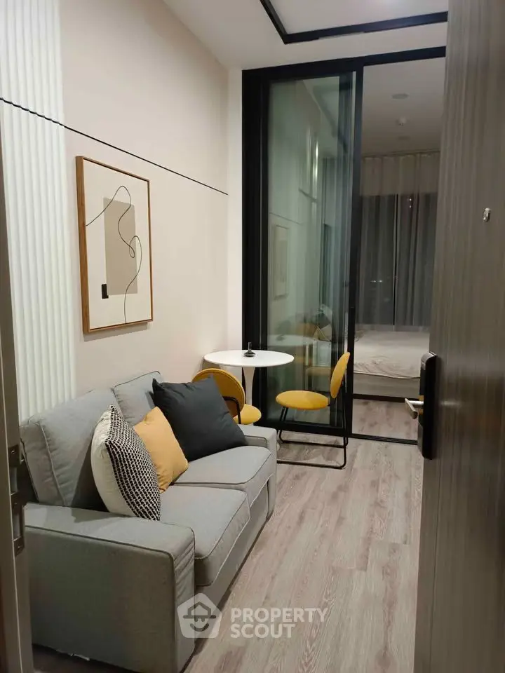 Modern compact living room with stylish decor and cozy seating area