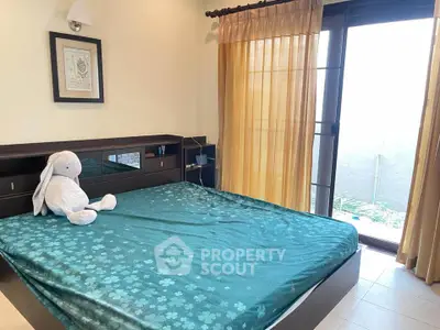 Cozy bedroom with natural light and stylish decor