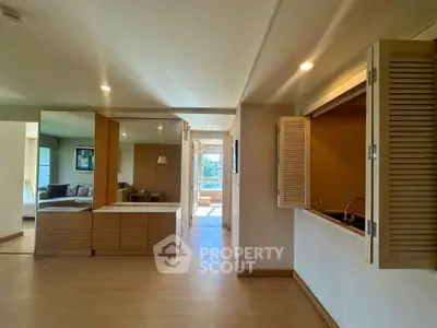 Spacious open-plan living area with modern design and ample natural light.