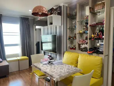 Charming living room with modern decor and vibrant yellow seating