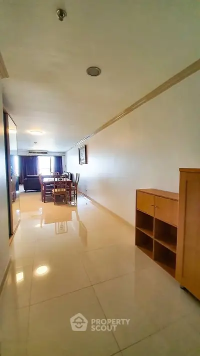 Spacious living room with dining area and modern furnishings