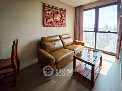 Stylish living room with leather sofa and city view in modern apartment