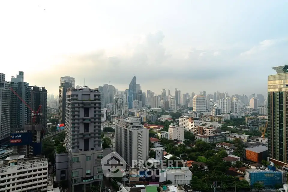 Stunning cityscape view showcasing modern skyscrapers and lush greenery, perfect for urban living enthusiasts.