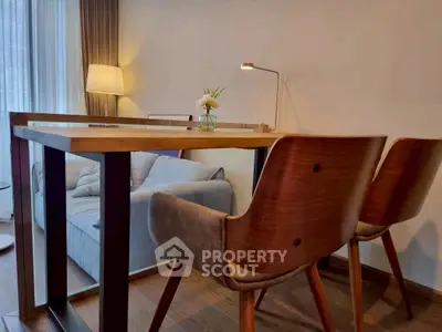 Modern living room with stylish wooden furniture and cozy lighting