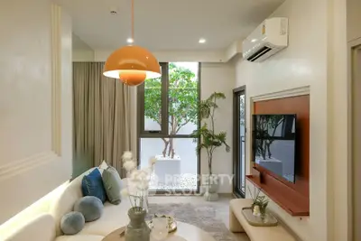 Stylish modern living room with large window and cozy seating area