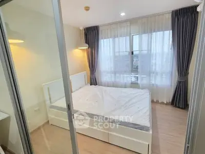 Bright and modern bedroom with large windows and stylish curtains