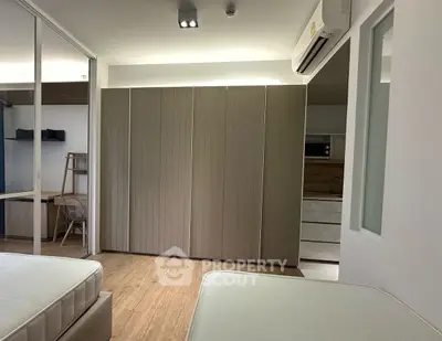 Modern bedroom with sleek design and built-in storage
