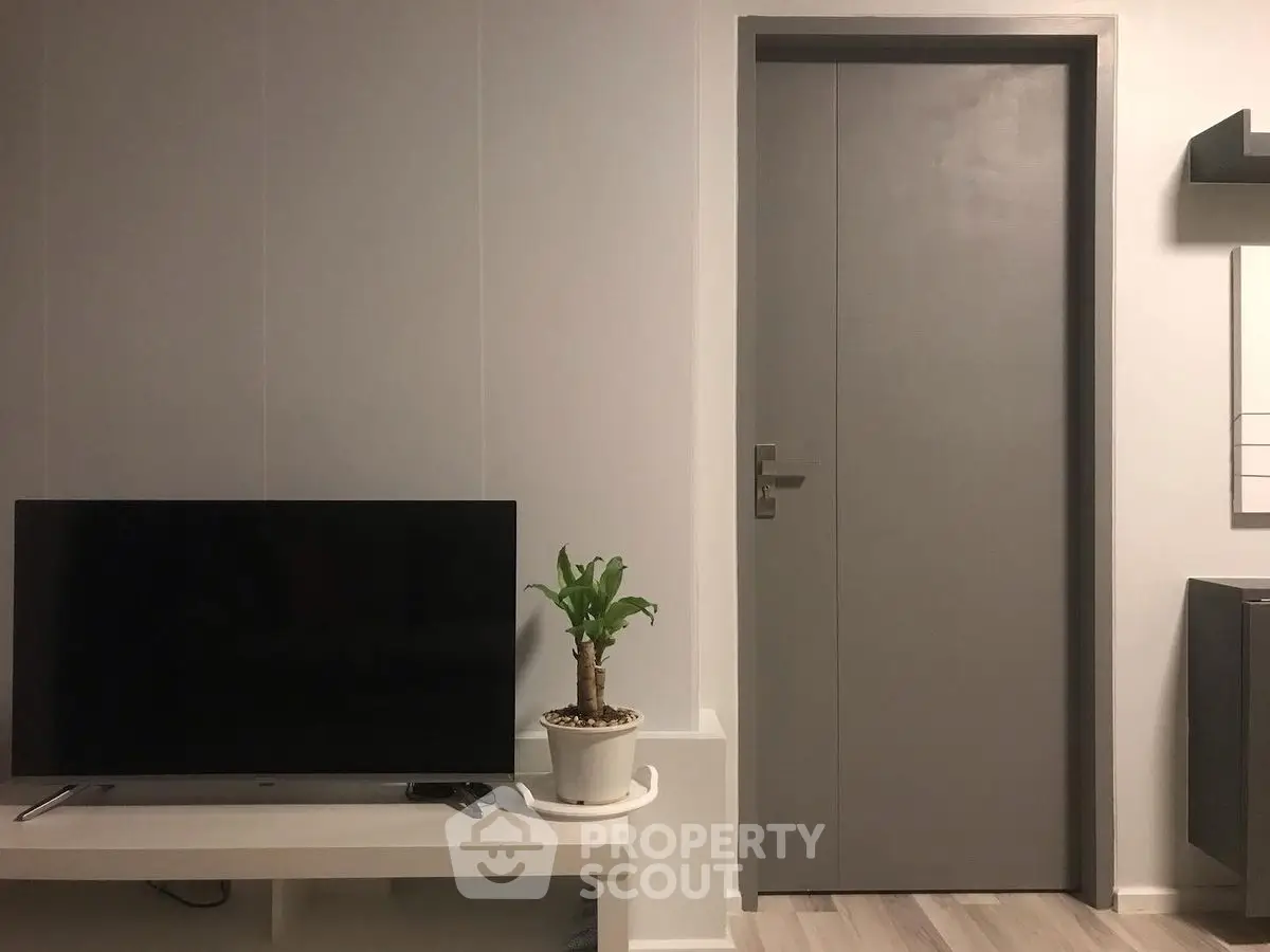 Modern living room with sleek TV setup and minimalist decor