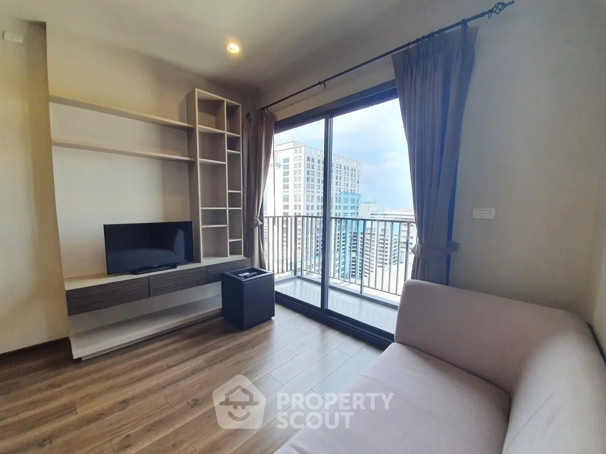 Modern living room with balcony view in urban apartment