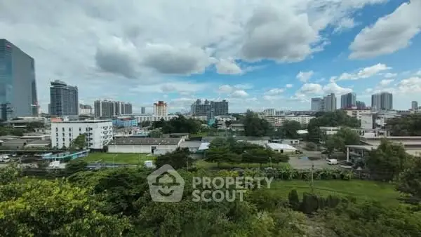 Stunning cityscape view with lush greenery and modern skyline