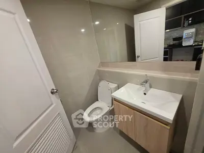 Modern bathroom with sleek fixtures and neutral tones