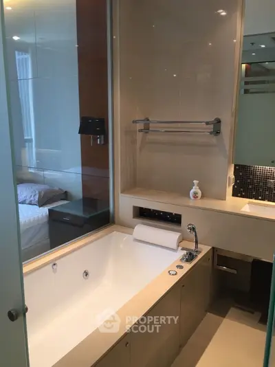 Luxurious bathroom with modern bathtub and sleek design in upscale apartment