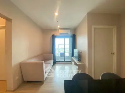 Modern living room with balcony view and cozy furniture