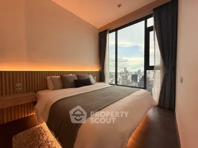 Luxurious bedroom with stunning city view and modern decor
