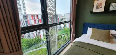 Modern bedroom with large window offering stunning cityscape view in contemporary apartment.