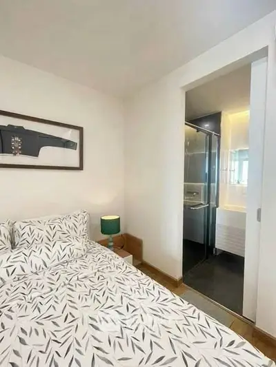 Cozy bedroom with ensuite bathroom and stylish decor