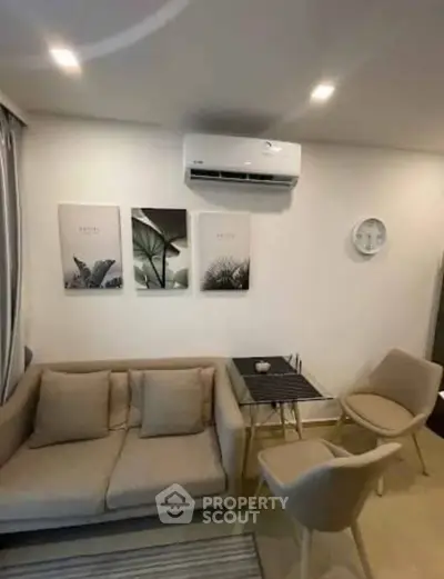 Cozy living room with modern decor and air conditioning