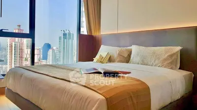 Luxurious bedroom with stunning city view and elegant decor