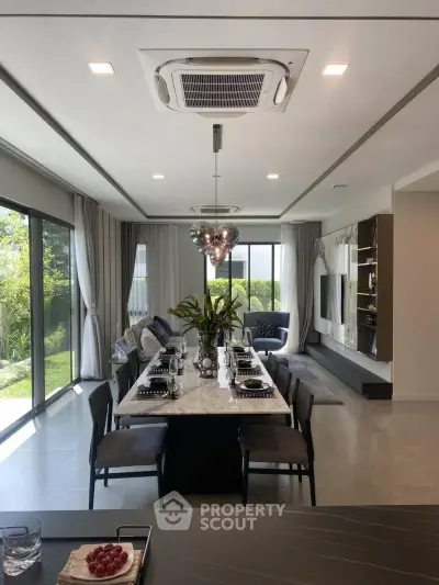 Luxurious dining room with elegant table setting and garden view