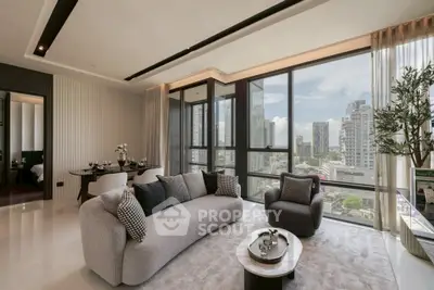 Luxurious modern living room with panoramic city views and elegant furnishings.