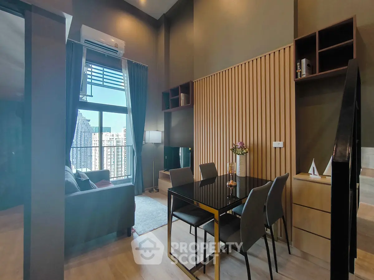 Modern living room with high ceiling and large window offering city view