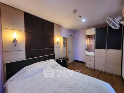 Cozy bedroom with modern design and ample storage space