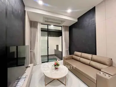 Modern living room with sleek design and comfortable seating