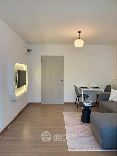 Modern living room with stylish decor and cozy dining area