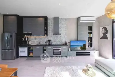 Modern open-layout kitchen with sleek appliances and stylish decor