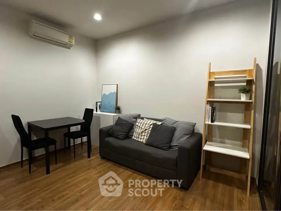 Cozy living room with modern decor and wooden flooring