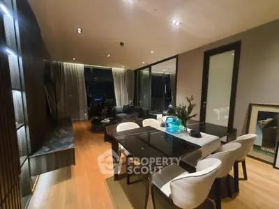Luxurious modern living room with elegant dining area and city view