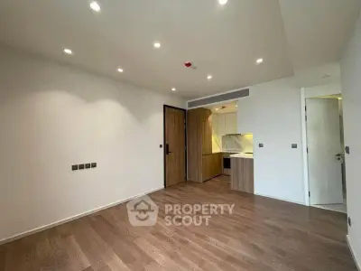 Modern apartment interior with open layout and wooden flooring